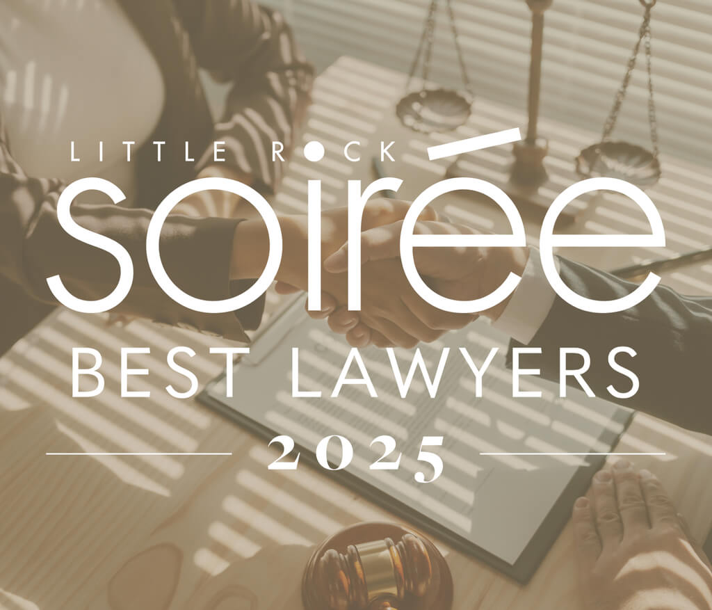 Two people in business attire shake hands across a desk with legal documents and a gavel. Overlaid text reads: “Little Rock Soirée Best Lawyers 2025.”.